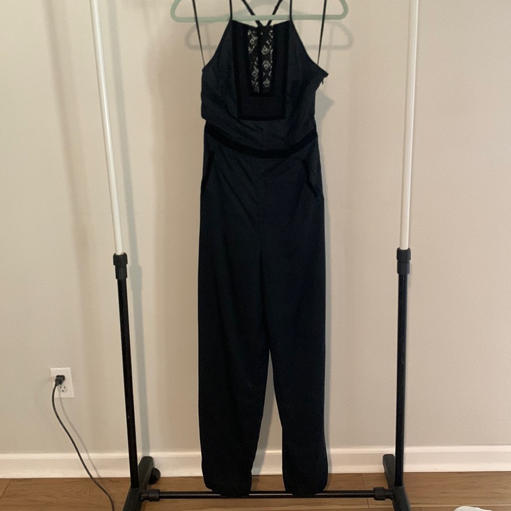Black, size 2, Free People jumpsuit. ONLY WORN ONCE.